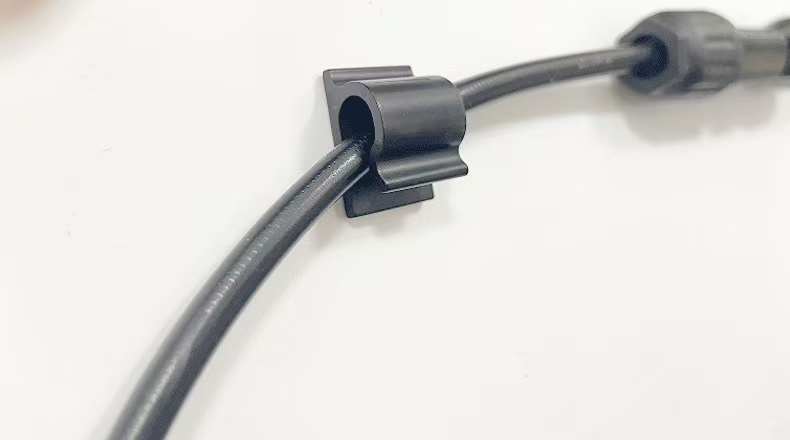 adhesive wire clamp